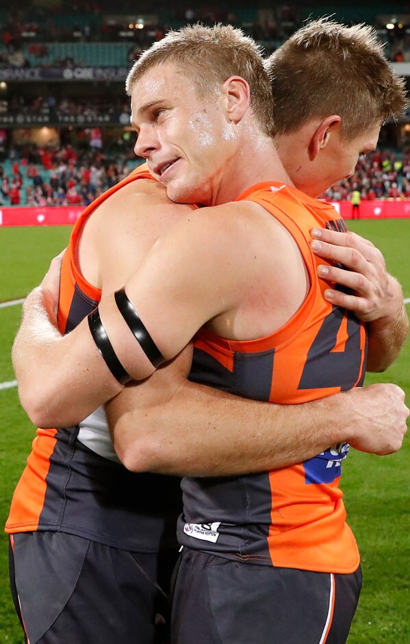 SLIDER-TOMMOONKENNERS.jpg Adam Kennedy and Adam Tomlinson embrace following the GIANTS' 2018 elimination final win over the Swans. - AFL,Adam Tomlinson,Adam Kennedy